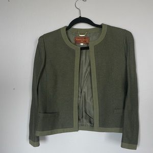 A beautiful green wool French jacket size small and gently used.